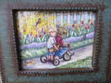 Kids Riding the Tricycle thru the Tulips